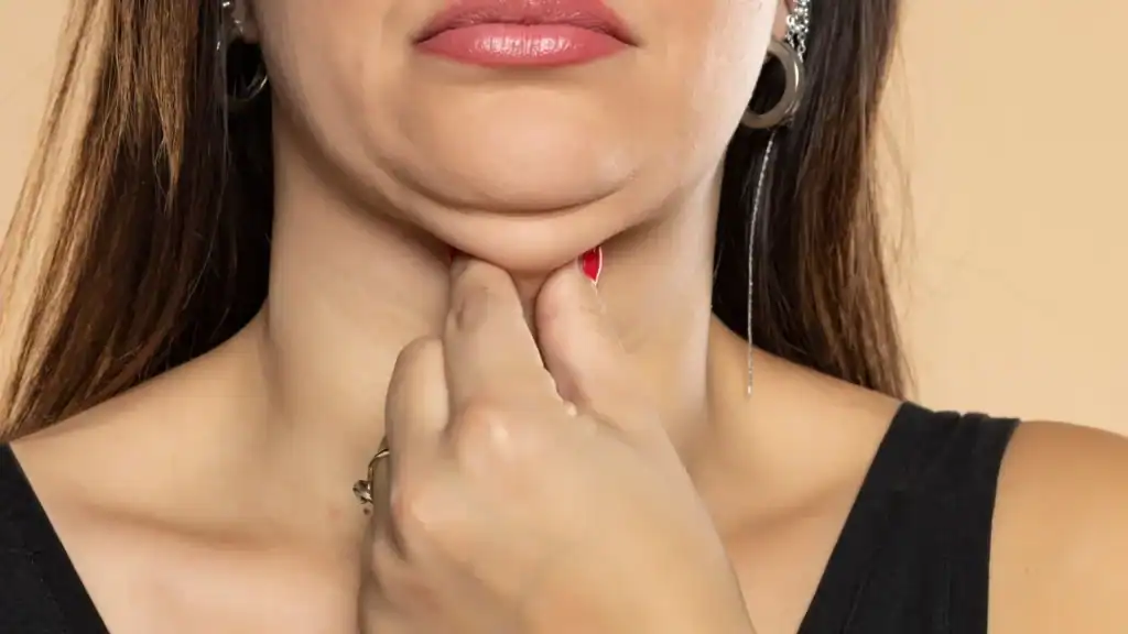 An image of a woman with double chin, sad, worried : Non Surgical Double Chin Removal Treatment in Southam, UK